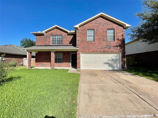 view of front property with a front yard and a garage