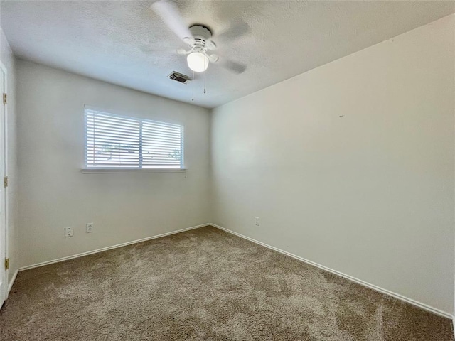 unfurnished room featuring carpet and ceiling fan