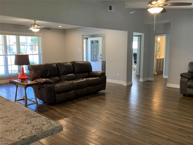 living room featuring ceiling fan