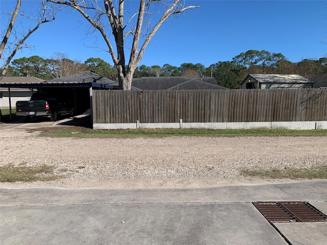 view of yard with a carport