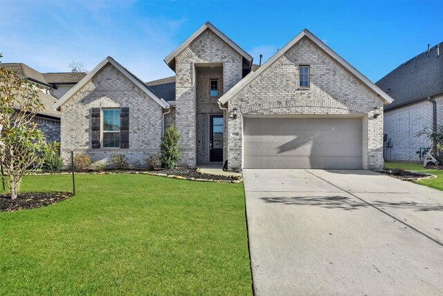 french country home with a front yard