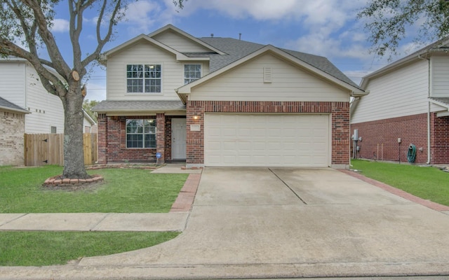 view of front of home with a front lawn and a garage