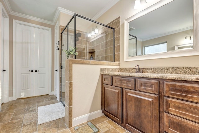 bathroom featuring ornamental molding, a shower with shower door, and vanity