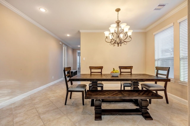 dining space featuring a notable chandelier, crown molding, and light tile patterned flooring