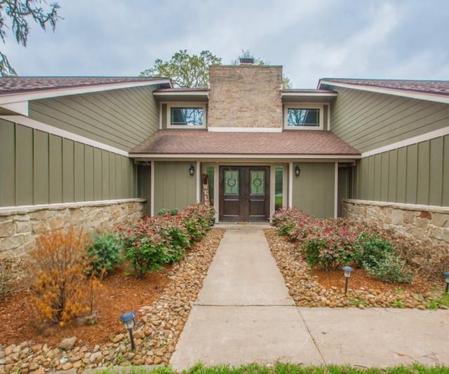 entrance to property with french doors