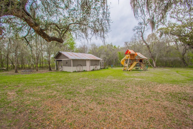 view of yard with a playground