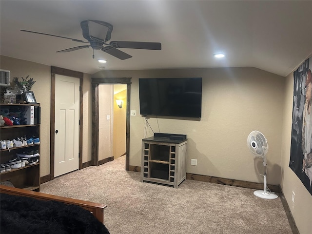 bedroom with carpet, ceiling fan, and lofted ceiling