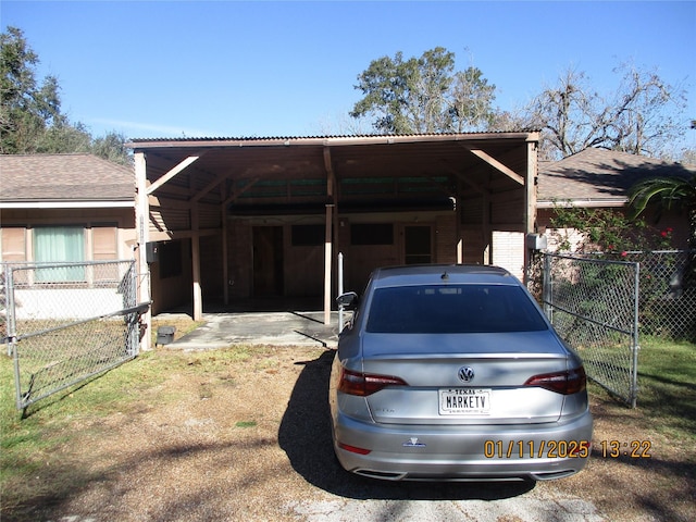 exterior space featuring a carport