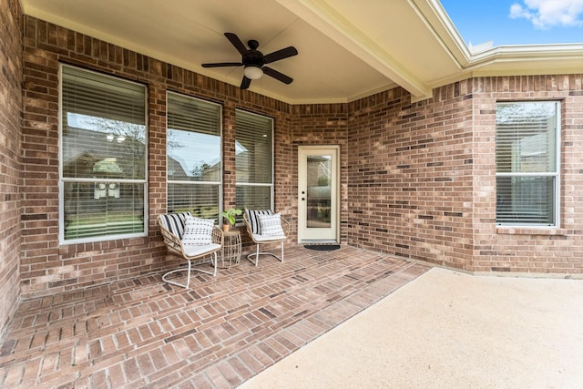 view of patio with ceiling fan