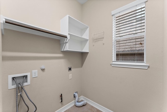 washroom with gas dryer hookup, tile patterned floors, hookup for a washing machine, and electric dryer hookup