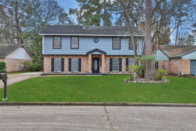 view of front of home with a front yard