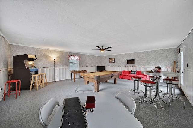 game room featuring wallpapered walls, billiards, wainscoting, ornamental molding, and carpet floors