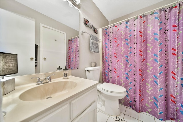 bathroom featuring vanity, toilet, and tile patterned floors