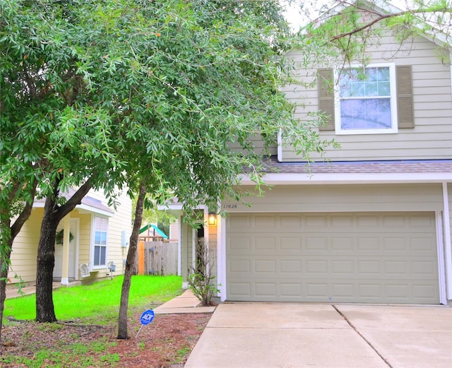 view of front of property featuring a garage