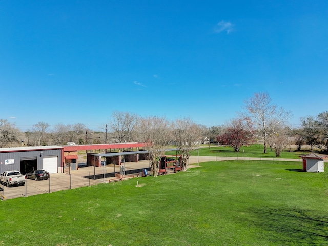 exterior space with a yard and an outdoor structure