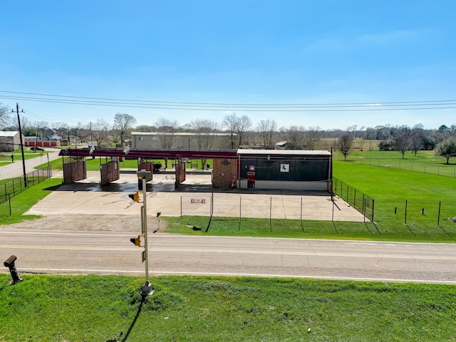 surrounding community featuring a lawn