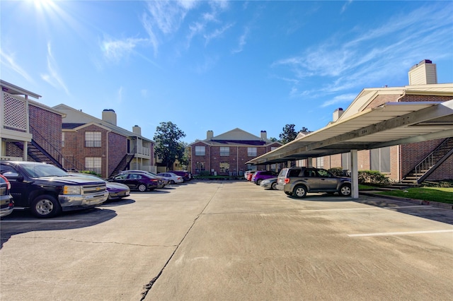 view of car parking with a carport