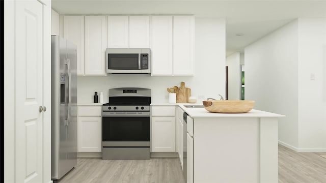 kitchen featuring kitchen peninsula, light wood-type flooring, stainless steel appliances, and white cabinets