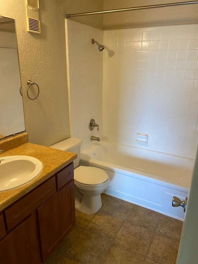 full bathroom with vanity, toilet, and shower / tub combination