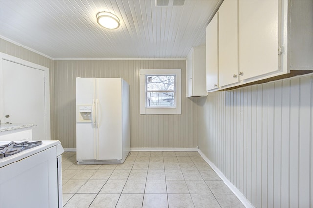 clothes washing area with ornamental molding