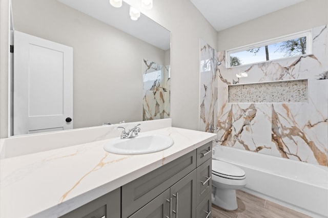 full bathroom featuring vanity, toilet, and shower / washtub combination