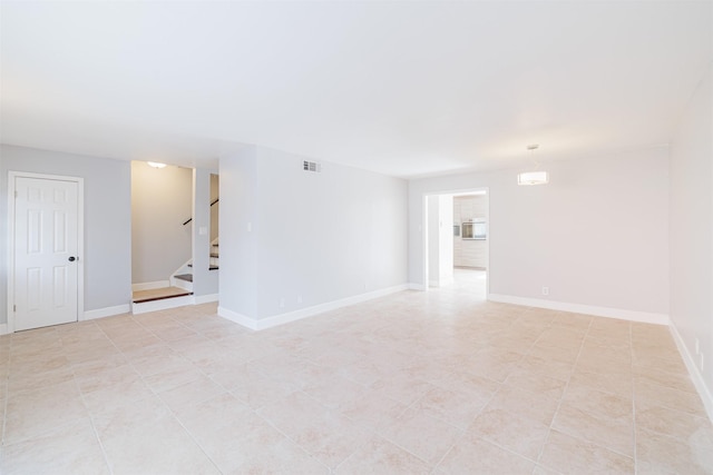 view of tiled spare room