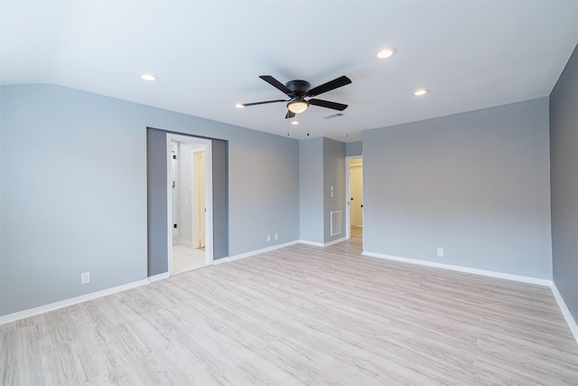 empty room featuring light hardwood / wood-style flooring and ceiling fan