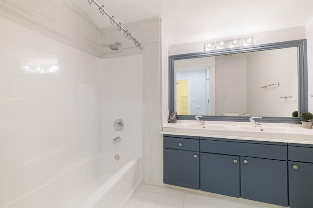 full bathroom with vanity, bathtub / shower combination, and toilet