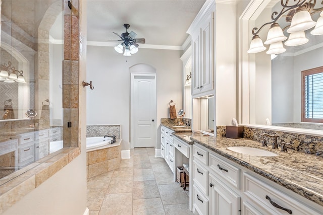 bathroom with vanity, a relaxing tiled tub, ceiling fan, and crown molding