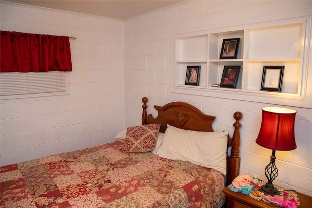 bedroom featuring ornamental molding