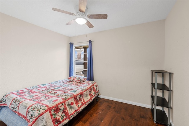 bedroom featuring ceiling fan and dark hardwood / wood-style flooring