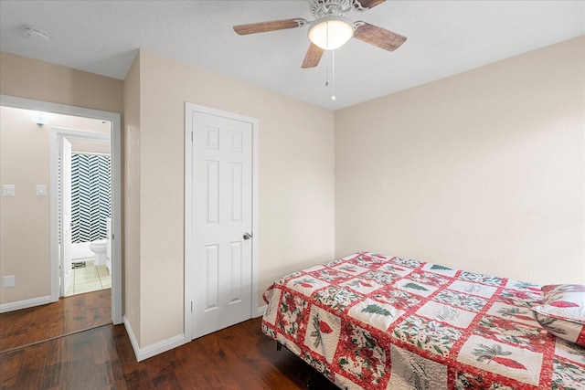 bedroom featuring ceiling fan and dark wood-type flooring