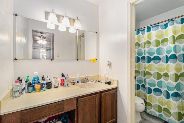 bathroom featuring toilet, a shower with shower curtain, vanity, and hardwood / wood-style floors