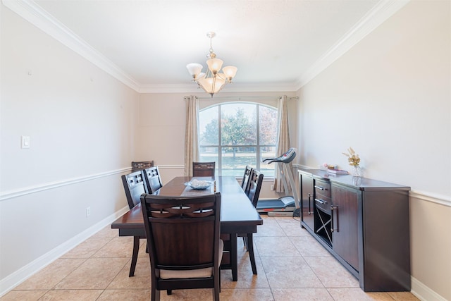 dining room featuring ornamental molding, light tile patterned floors, and a chandelier