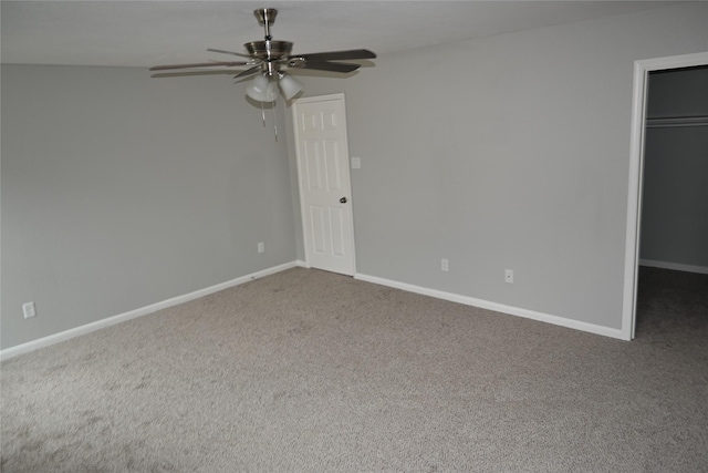 unfurnished bedroom with carpet, ceiling fan, and a closet