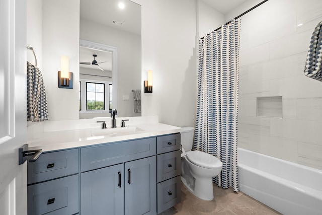 full bathroom featuring shower / tub combo, tile patterned floors, ceiling fan, toilet, and vanity