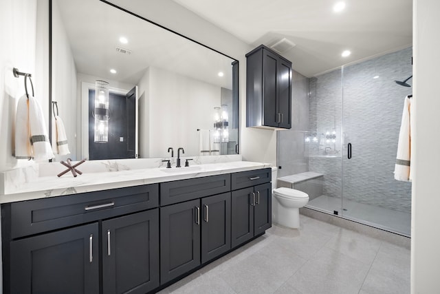 bathroom featuring vanity, toilet, and walk in shower