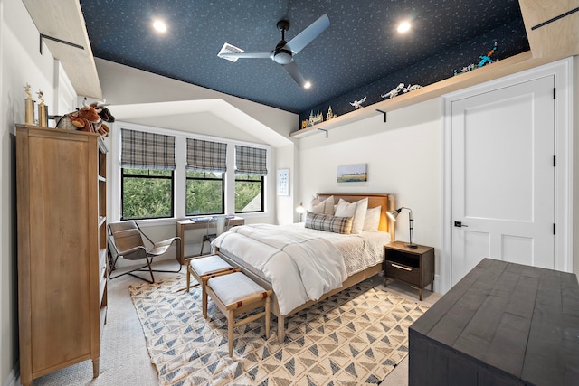 bedroom featuring light colored carpet and ceiling fan