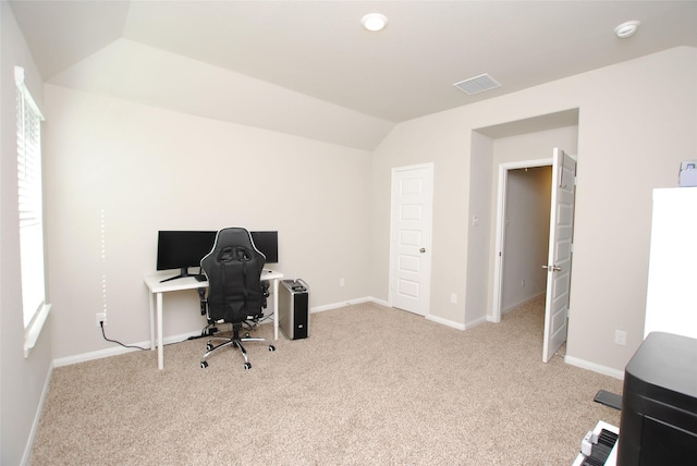 office area with light carpet and lofted ceiling