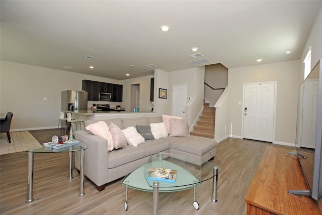 living room featuring light hardwood / wood-style flooring