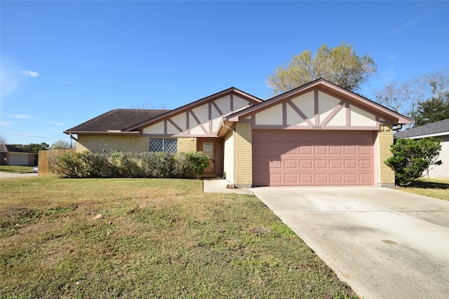 view of front facade featuring a garage and a front yard