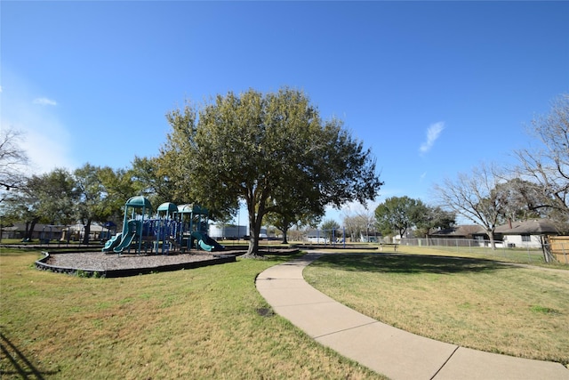 view of playground featuring a lawn