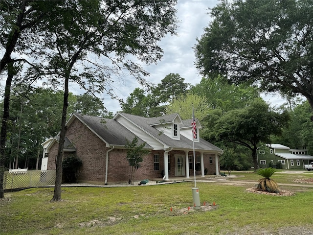 view of front of home with a front yard