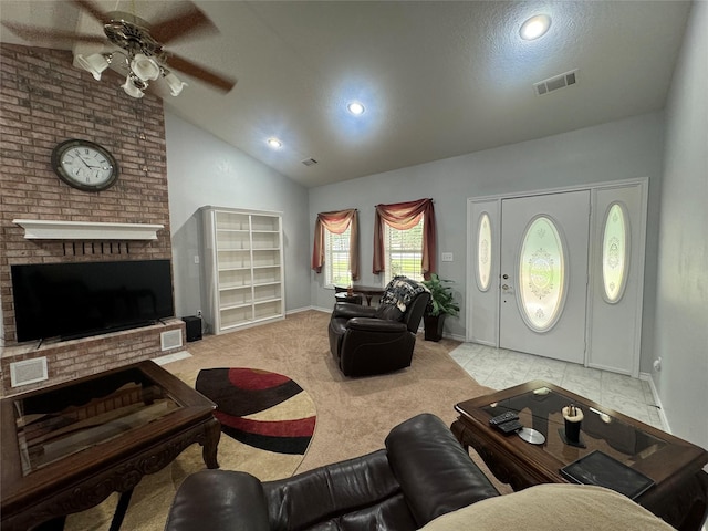 17 Cottonwood Rd, Trinity, TX 75862 - carpeted living room with a ceiling fan, lofted ceiling, a brick fireplace, baseboards, and recessed lighting