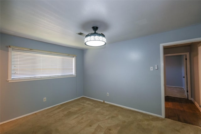 view of carpeted spare room