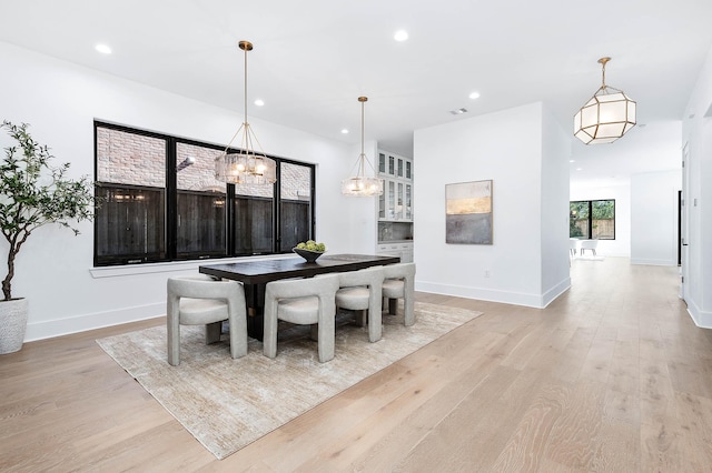 dining room with light wood-type flooring