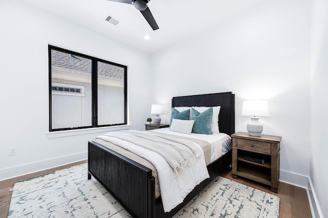 bedroom featuring ceiling fan and hardwood / wood-style floors