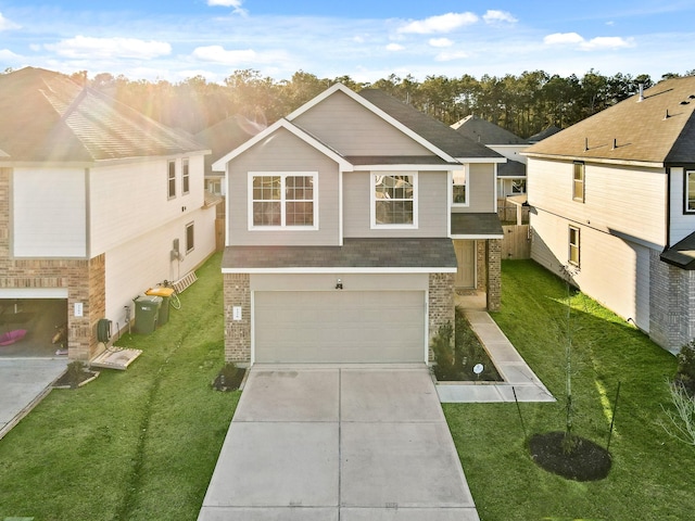 view of front facade with a garage and a front lawn