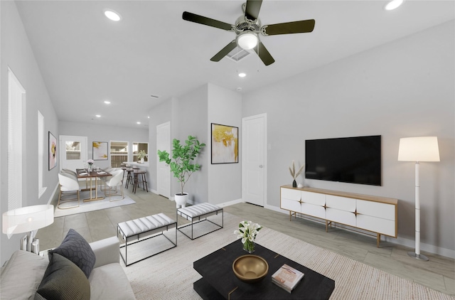 living room featuring ceiling fan