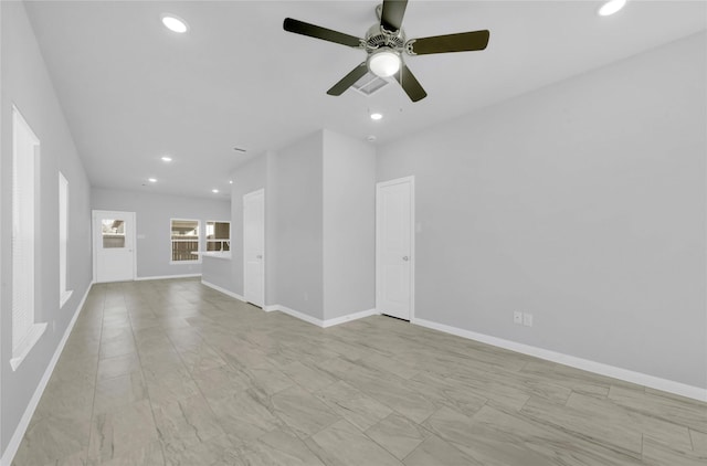 interior space featuring ceiling fan